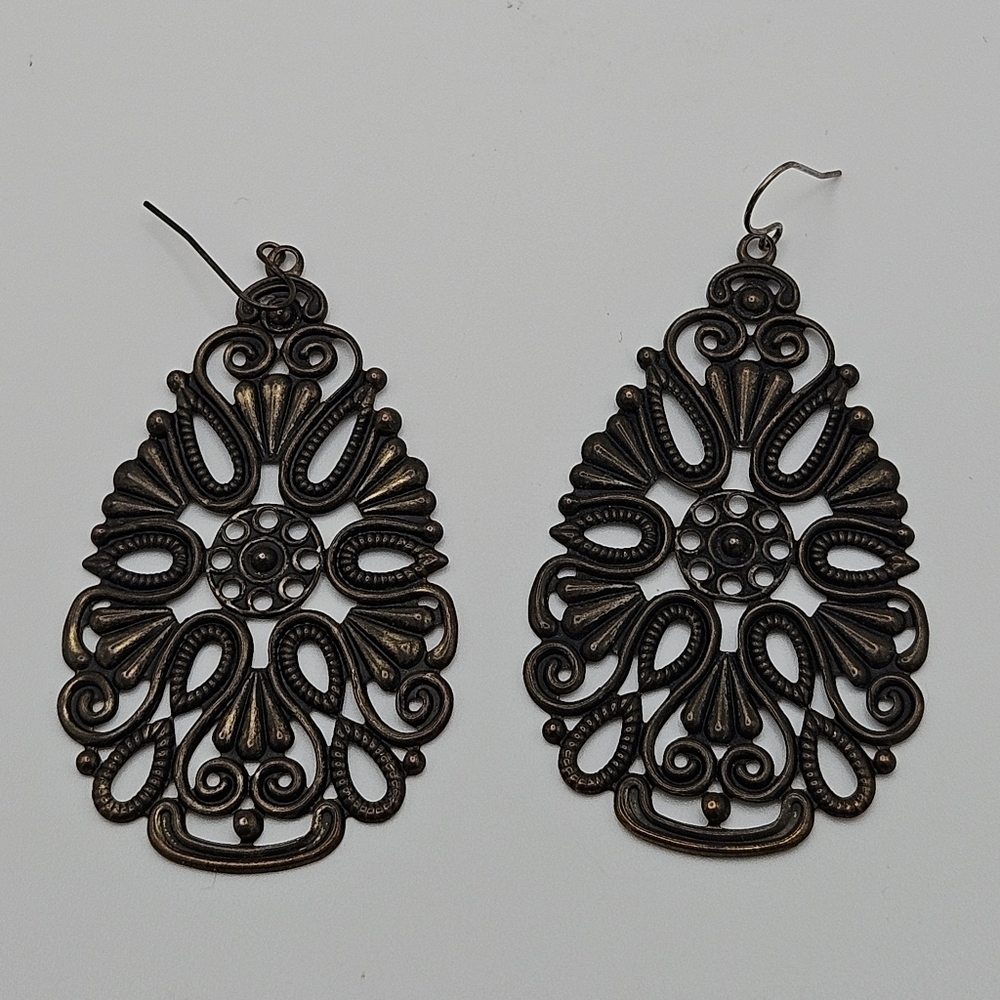 dark bronze colored teardrop dangle earrings with cutouts